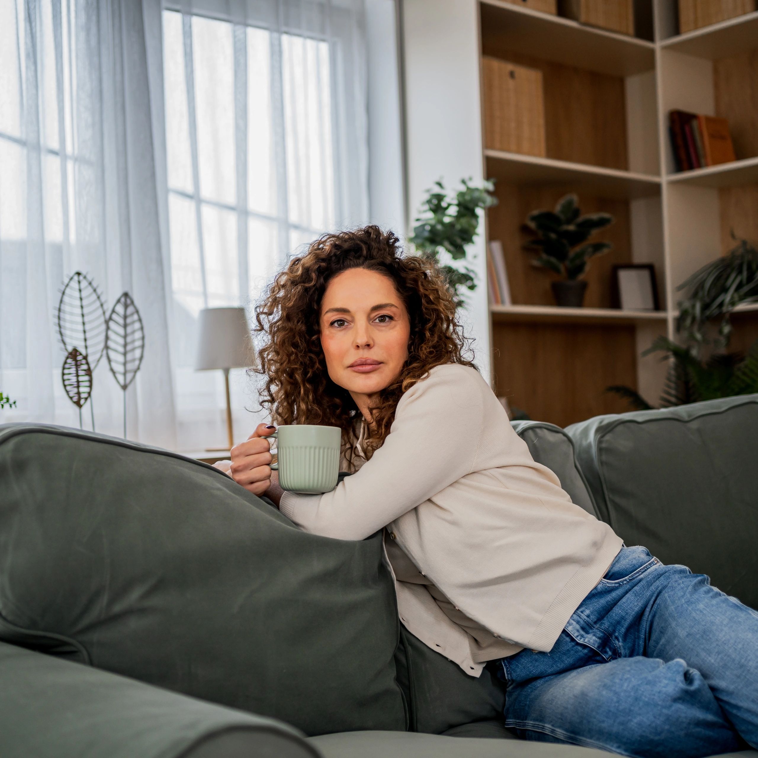 Woman relaxing with a hot drink