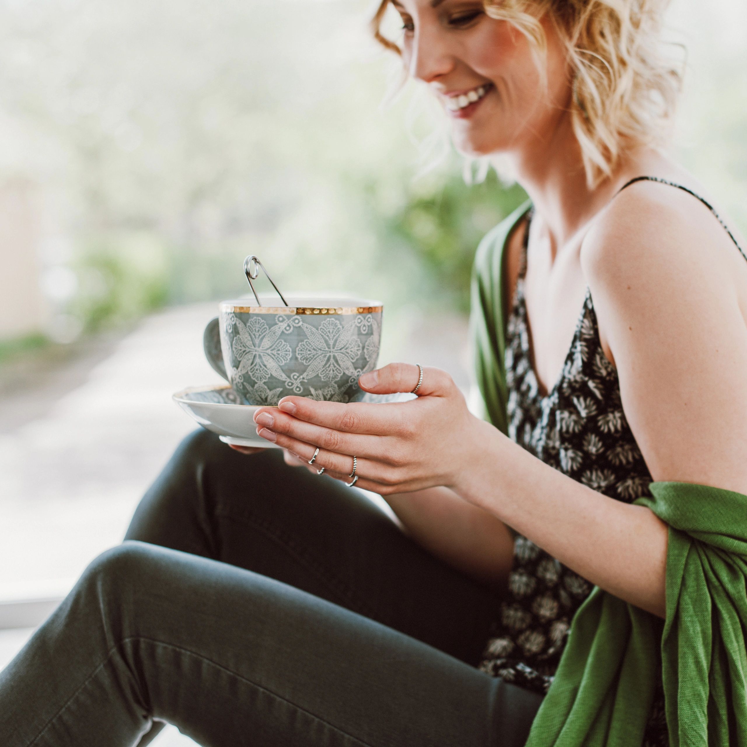 Woman enjoying a warm cup of tea